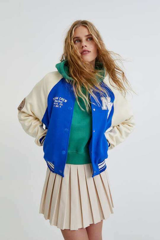 Blue varsity jacket with contrast sleeves and striped trims