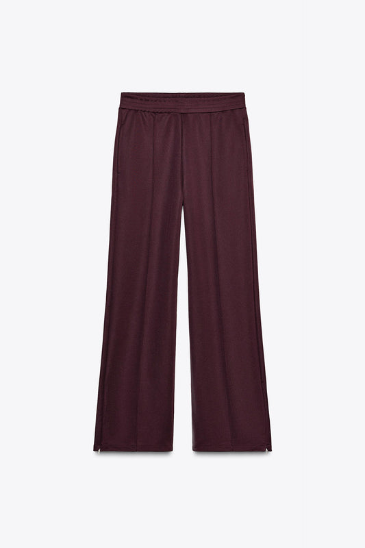BURGUNDY TROUSERS WITH ZIPS