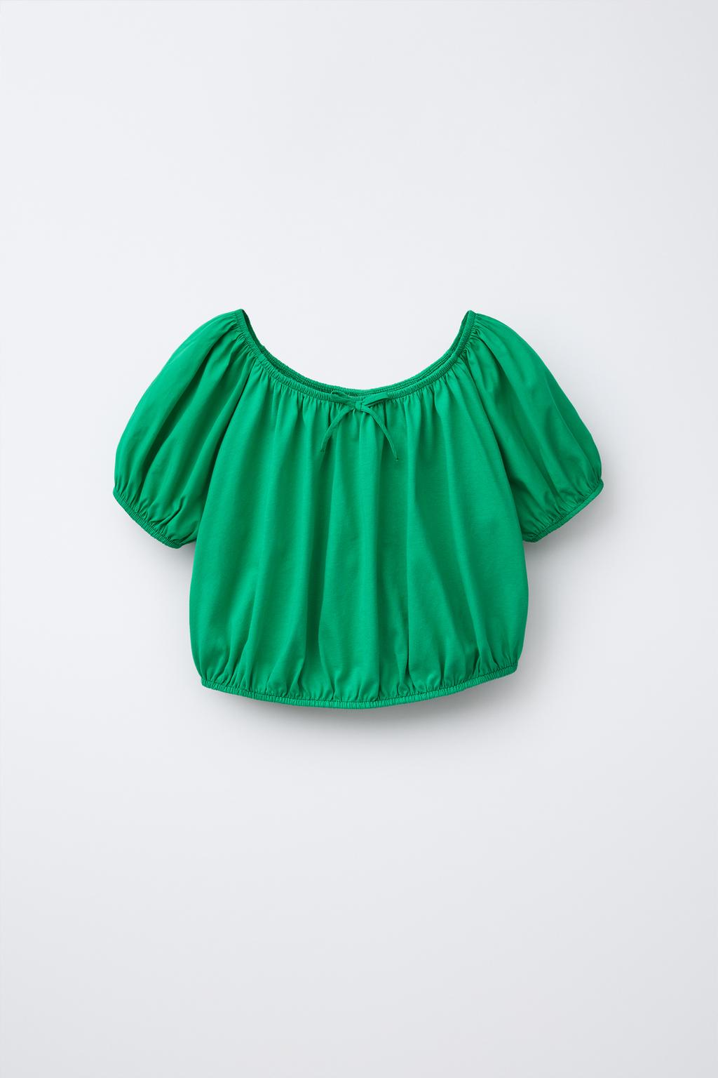 COTTON TOP FEATURING SHORT BALLOON SLEEVES