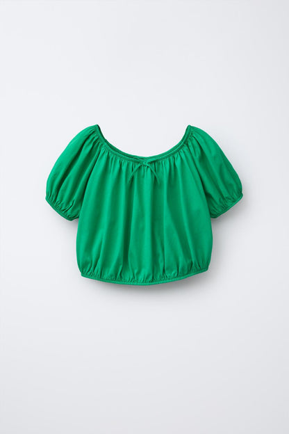 cotton top featuring short balloon sleeves
