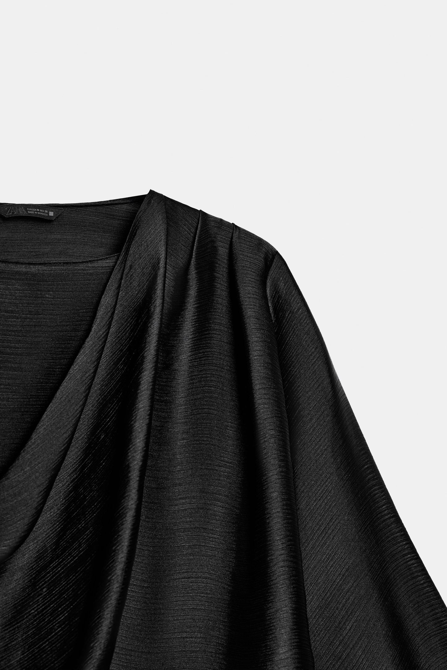 [A2] ASYMMETRIC DRAPED TOP