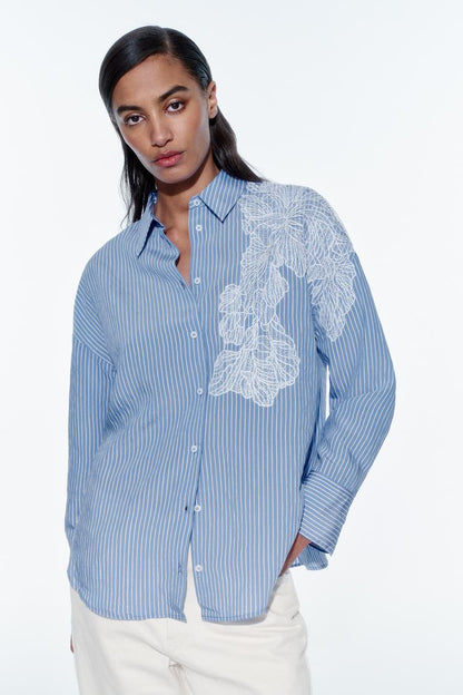 [A2] Striped shirt with floral embroidery