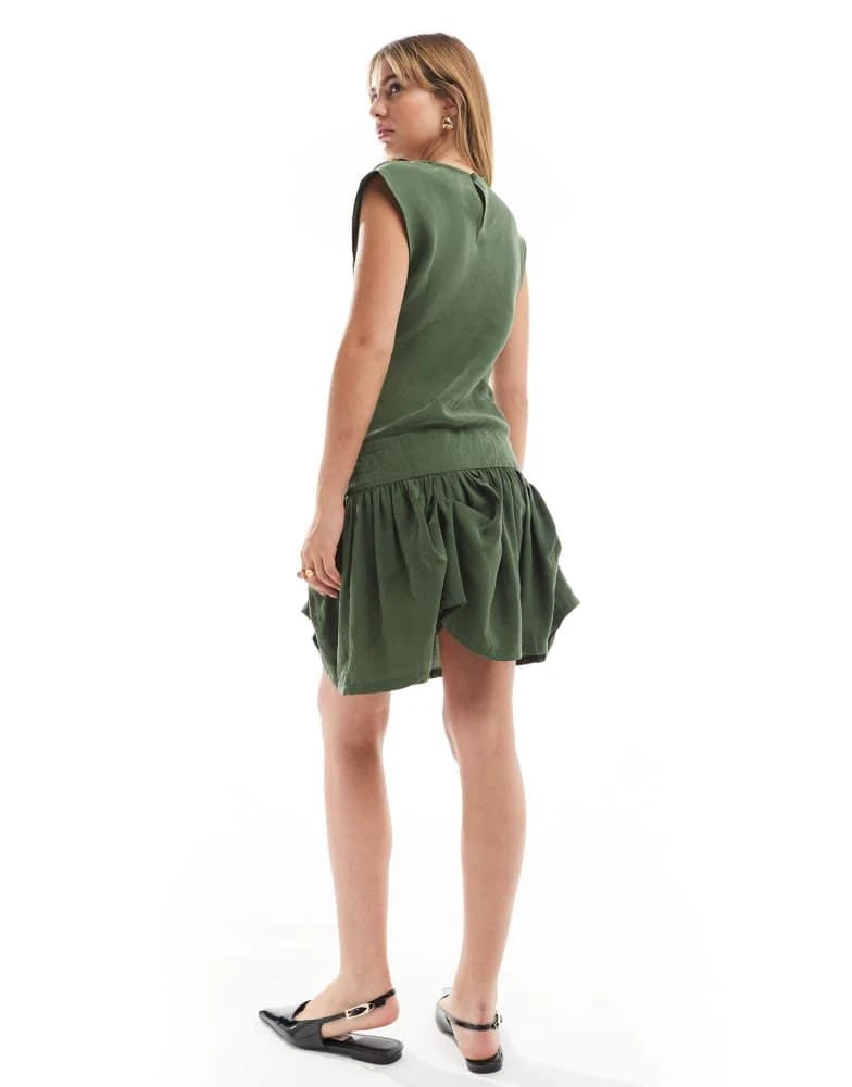 COWL NECK HITCHED HEM CUPRO MINI DRESS IN DARK GREEN