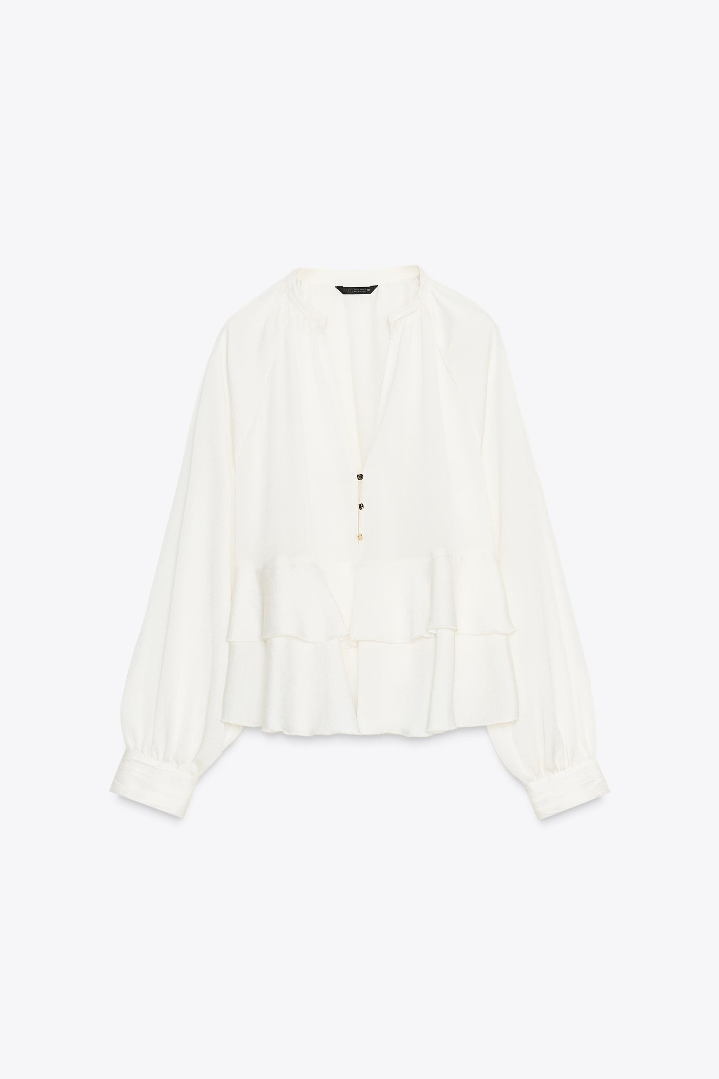 White blouse with ruffle