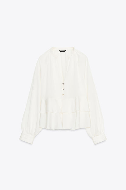 White blouse with ruffle