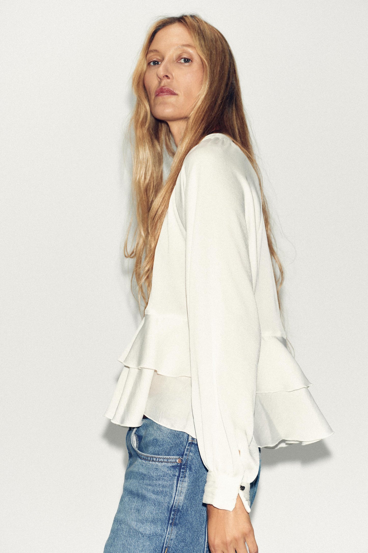 White blouse with ruffle