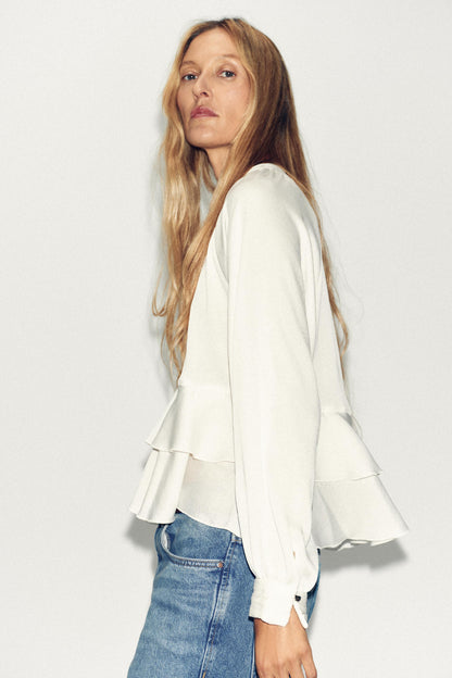 White blouse with ruffle