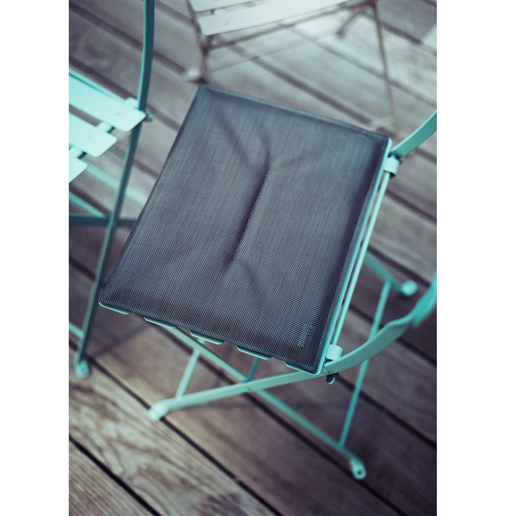 Fermob Bistro Basics outdoor cushion fitted to a Bistro folding chair