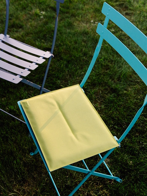 Fermob Bistro Basics cushion shown on Bistro chair outdoors